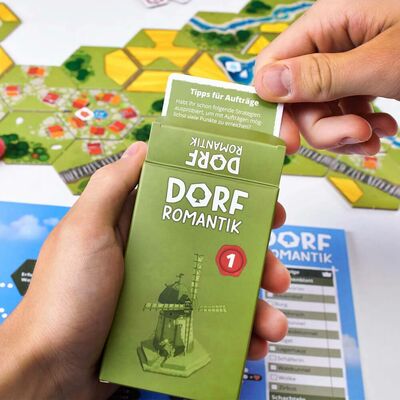 Dorfromantik - das Spiel des Jahres 2023 ist bei Papeterie und Spielwaren Schmid in Landquart (Graubünden) erhältlich
